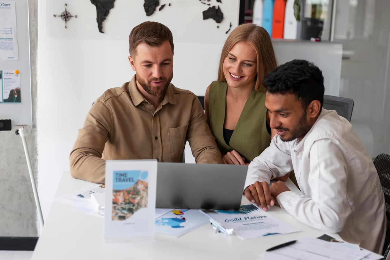 Colleagues reviewing results together on a laptop